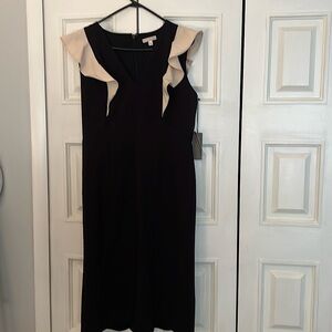 Size Large Eva Mendes black and cream ruffle detail dress